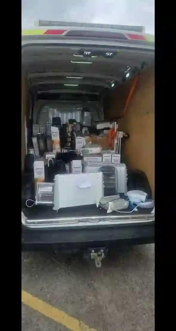 Van loaded with appliances and white goods